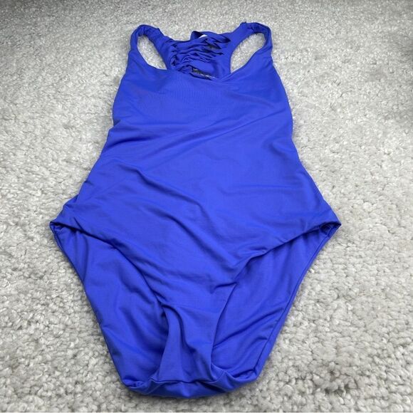 Becca Swim Purple Slash Cut Out Back Swimsuit - Picture 1 of 5